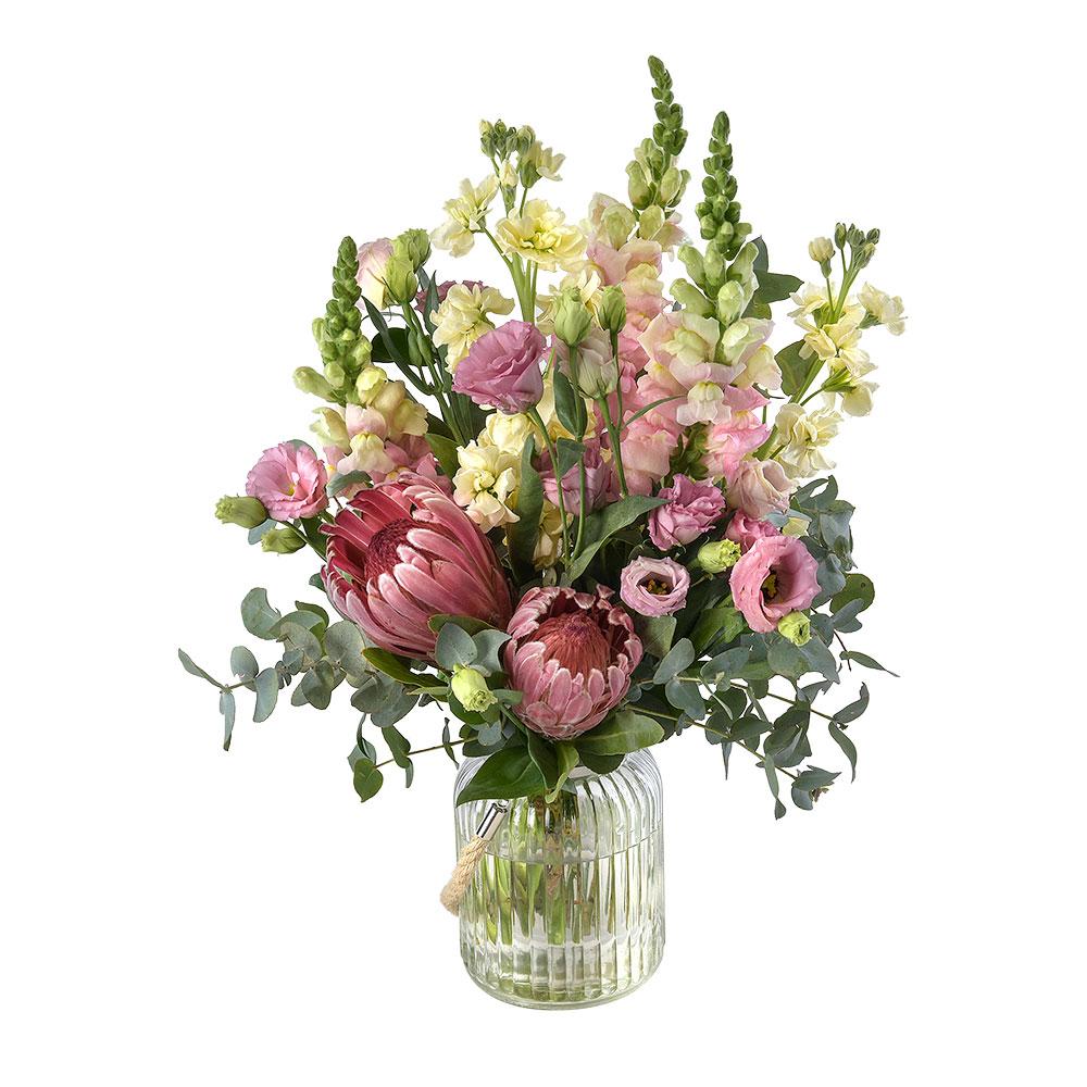 Bouquet in a Glass Jar

This unique floral gift is brimming with beautiful pinks, soft yellows, and green foliage that is sure to delight. Proteas add a special touch to this bouquet that is presented in a modern glass vase. Treat them to Bliss.

Flowers may vary from the image displayed due to seasonal availability. We'll craft an arrangement which is similar in style using seasonal flowers that is equal or greater in value. 