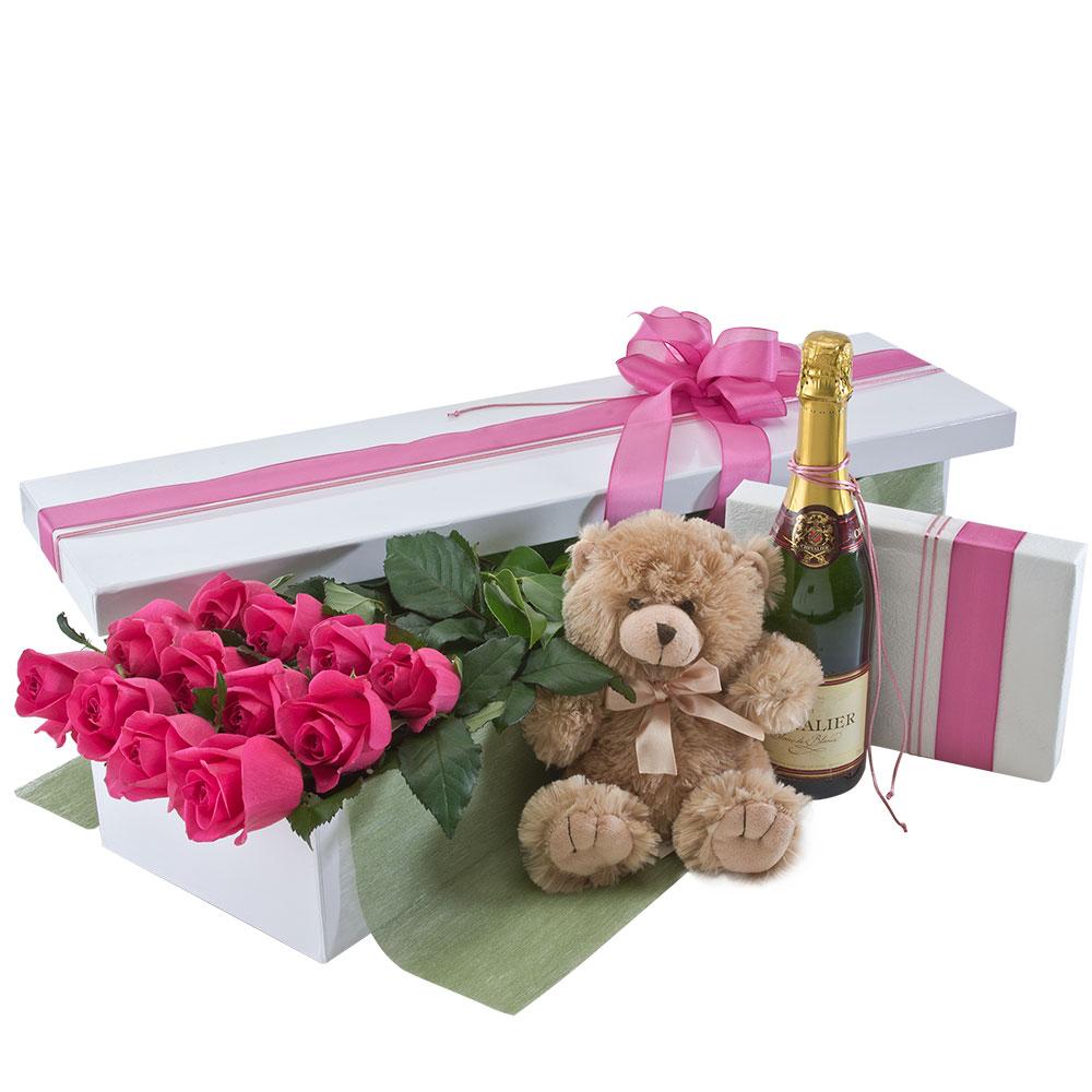 Presentation box of 12 Long Stemmed Pink Roses, Sparkling Wine, Chocolates & Teddy Bear

Spoil your loved one with Grand Seduction. One dozen long-stemmed pink roses are accompanied by sparkling wine, chocolates and an adorable teddy bear. Impress them with this elegant and romantic gift.

Flowers may vary from the image displayed due to seasonal availability. We'll craft an arrangement which is similar in style using seasonal flowers that is equal or greater in value. 