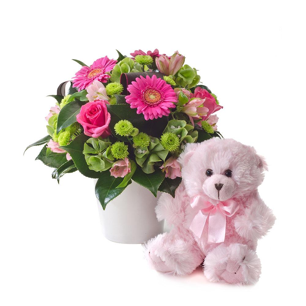 Bright Mixed Arrangement with a Teddy Bear

A delightful gift for the arrival of a new baby girl. A bright mixed arrangement of flowers in a ceramic pot, accompanied by a gorgeous pink teddy bear, suitable for delivery to a home or hospital.

Flowers may vary from the image displayed due to seasonal availability. We'll craft an arrangement which is similar in style using seasonal flowers that is equal or greater in value. 