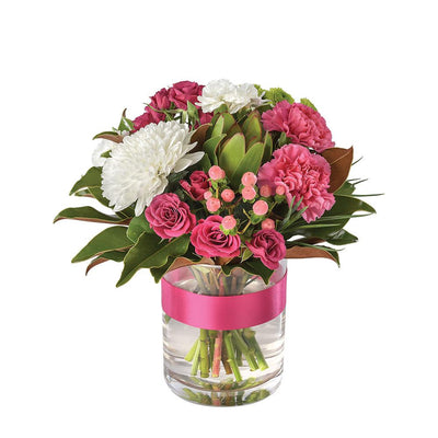 Mixed Posy in a Glass Vase

Spoil a beautiful lady in your life with Pink Lady. A dazzling mixed bouquet with dreamy pinks, bright whites, and deep green foliage standing in a glass vase with pink ribbon. This thoughtful gift lives up to its name!

Flowers may vary from the image displayed due to seasonal availability. We'll craft an arrangement which is similar in style using seasonal flowers that is equal or greater in value. 