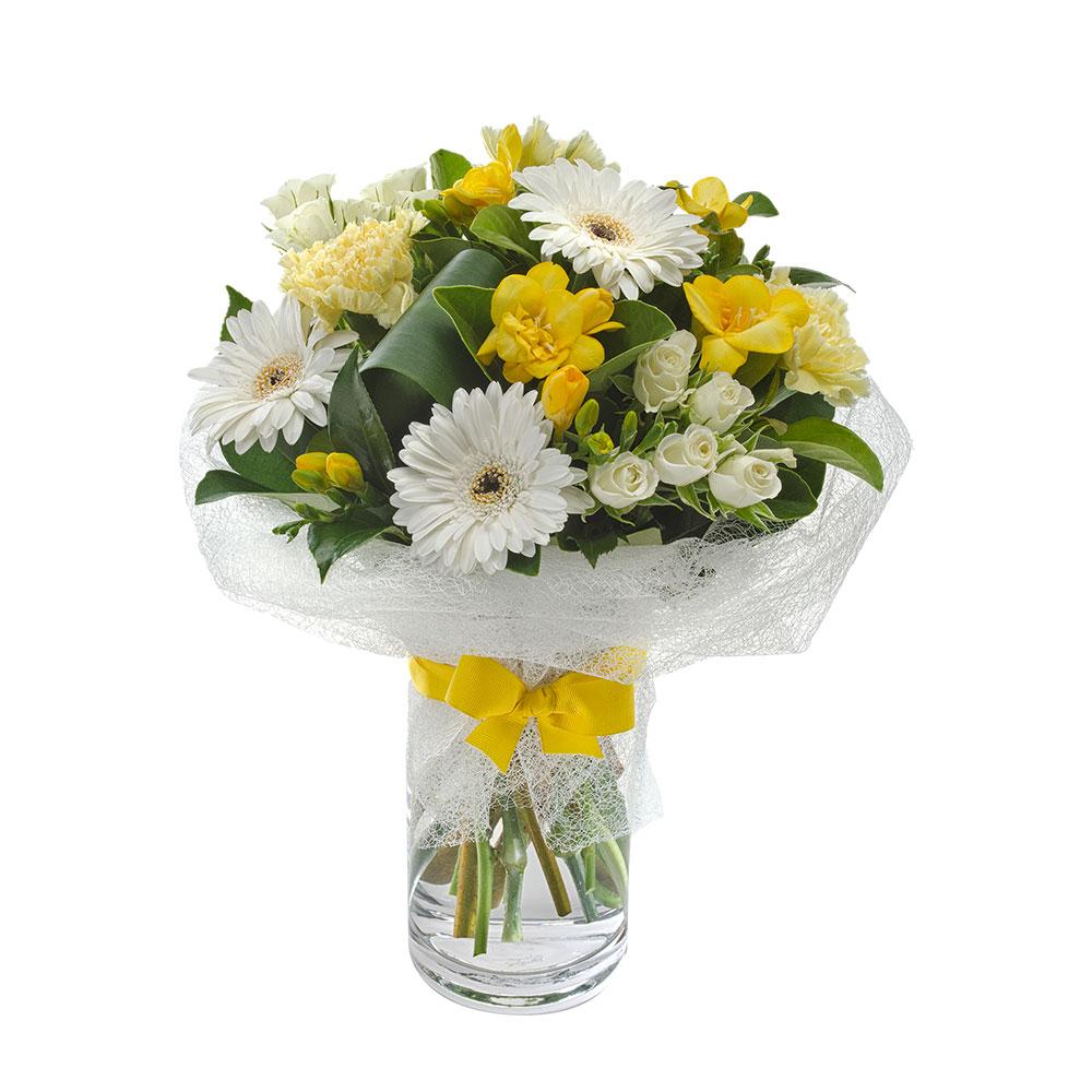Mixed Posy in a Glass Vase

Put a smile on their face with the splendid Sunrise. Vivid yellow blooms are expertly arranged amongst softer pastels and fresh whites, with lush green foliage. Wrapped in spun white fabric and standing tall in a glass vase with dazzling yellow ribbon, they will adore this floral gift.

Flowers may vary from the image displayed due to seasonal availability. We'll craft an arrangement which is similar in style using seasonal flowers that is equal or greater in value. 